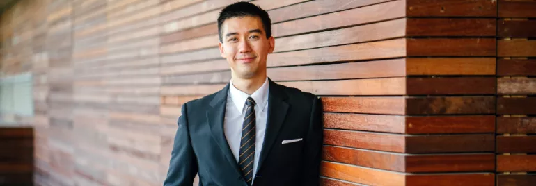 Asian man in suit, office worker, smiling